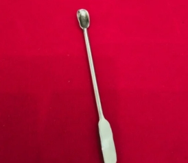 Silver measuring spoon